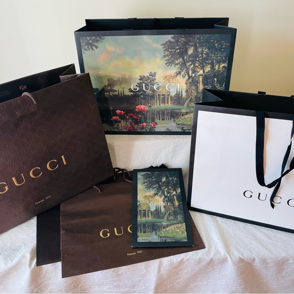 Assortment of Gucci Shopping Bags 3 large, 2 med, 1 small
